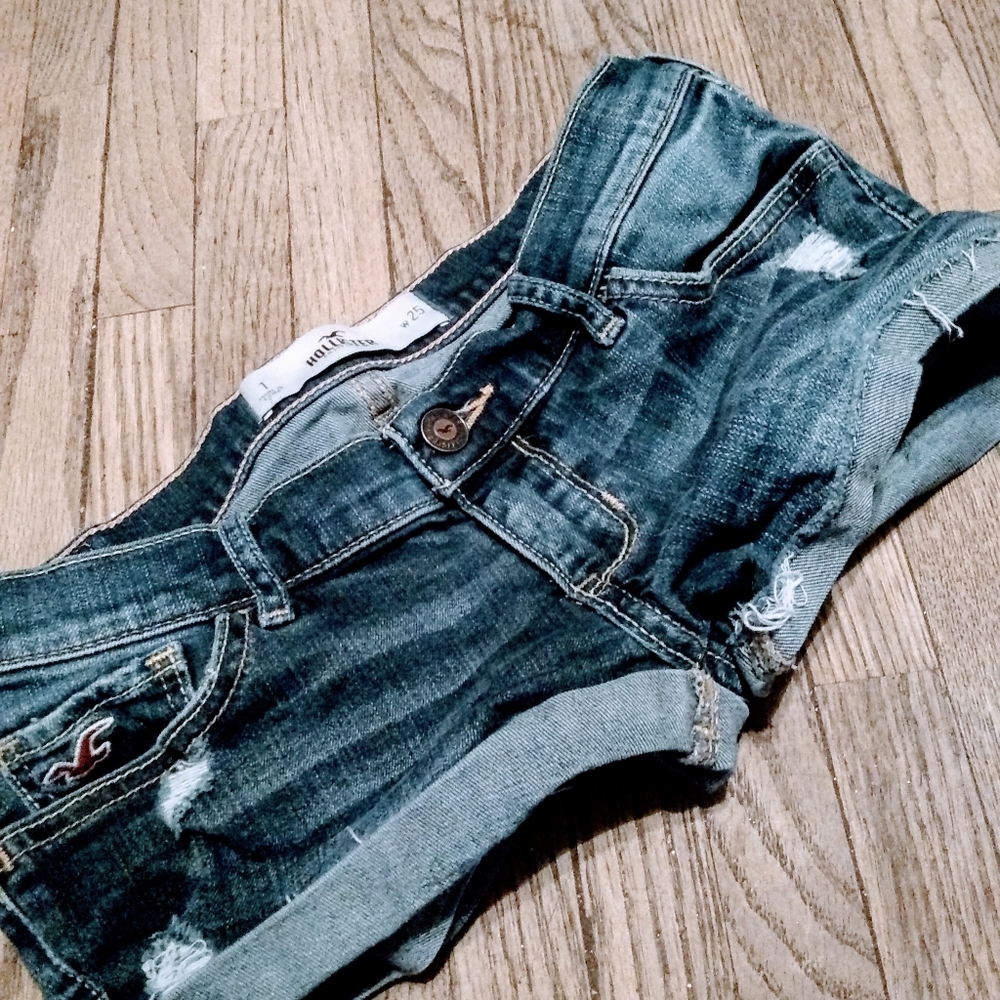Hollister medium wash raw rolled hem denim shorts